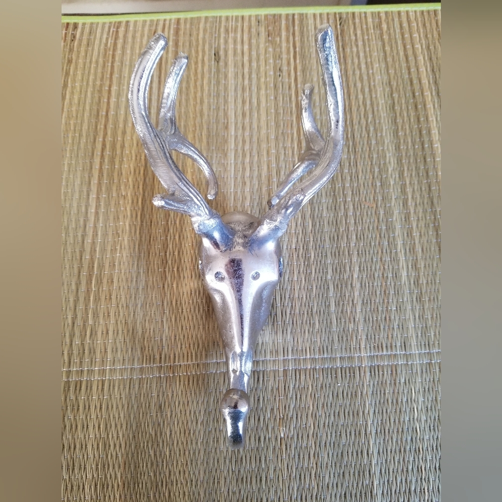 Silver toned metal hook